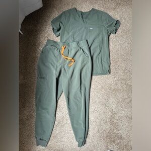 Figs scrubs size M top size L bottoms color moss